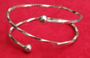 Double twist & ball bracelet