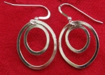 Two oval satin earrings