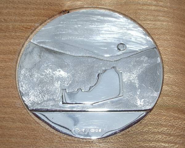 Silver insert of paperweight