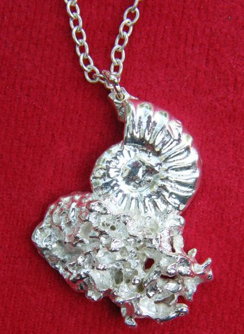 Pendant - ammonite in rock crystal 