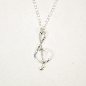 Small treble clef silver pendant