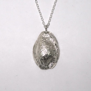 Silver half apricot stone pendant