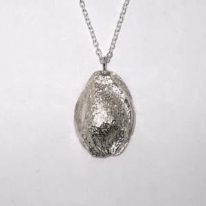 Silver half apricot stone pendant