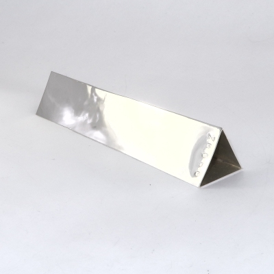 Rear - triangular silver ruler