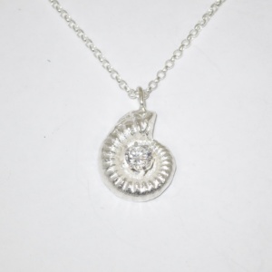 Solid silver ammonite pendant with stone