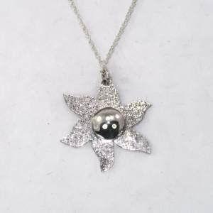 Silver St Hilda estoile pendant sparkly