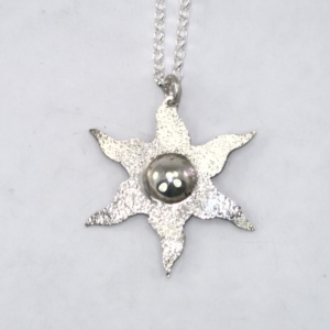 Silver estoile pendant - sparkly