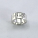 Punched and engraved silver ring