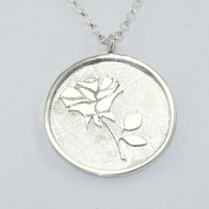 Silver rose pendant