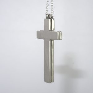 Matched silver crosses hanging together