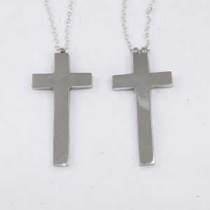 Matched silver cross pendants