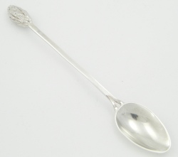 Spoon with olive stone finial